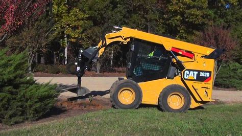 cat skid steer auger how to fill|cat skid steer auger rental.